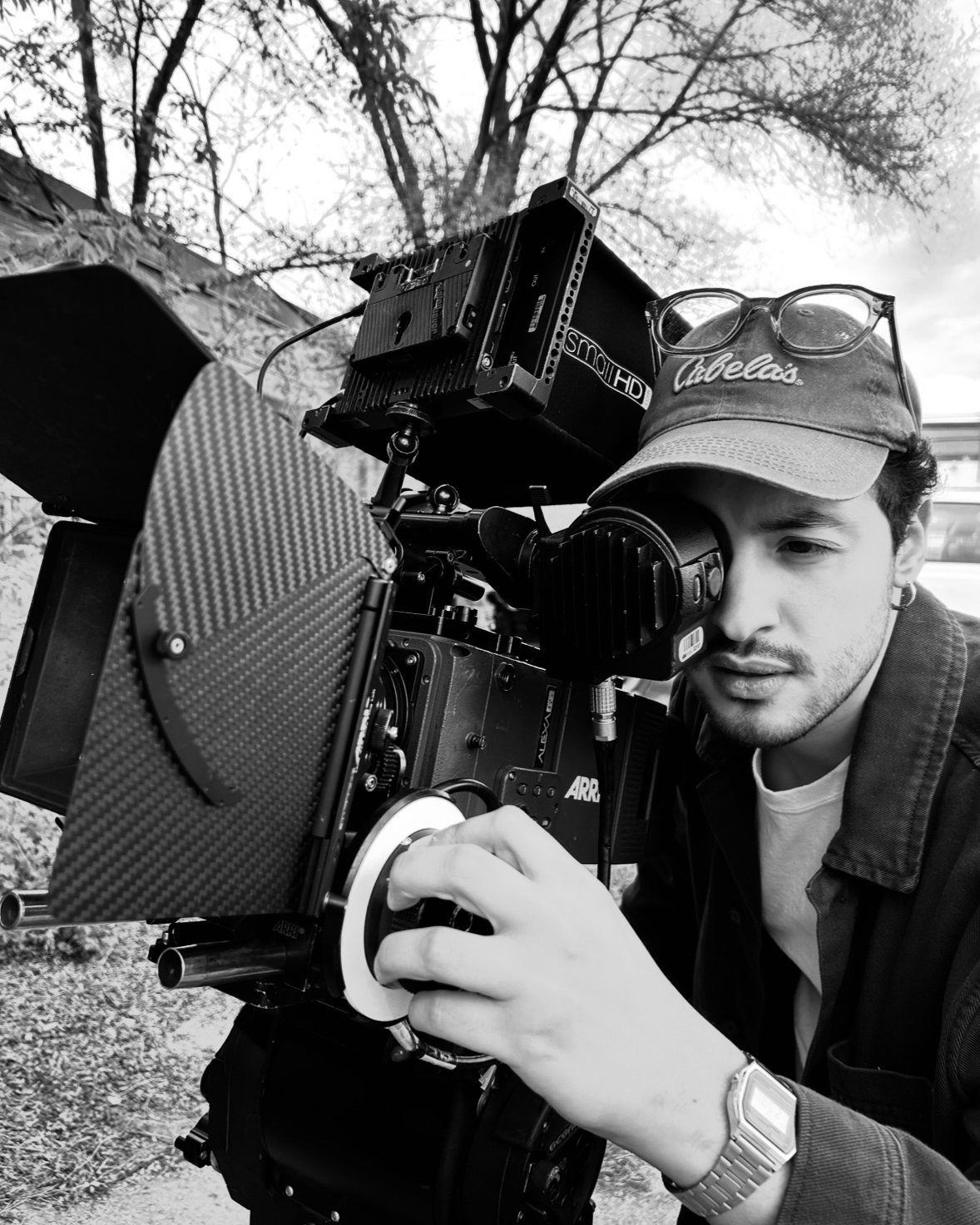 Youssef Ben Rajeb looking through the eyepiece of an ARRI Alexa while pulling focus