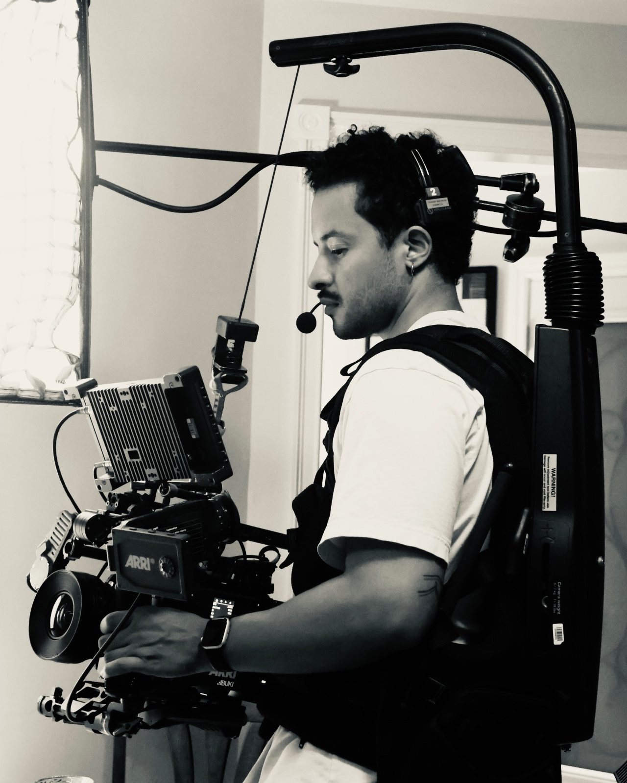 Youssef Ben Rajeb on set, operating an ARRI camera on a body-worn rig